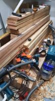 photo of a big pile of wood in the shed